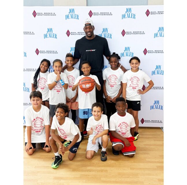 Miami Heat star Bam Adebayo with Florida City youth at his basketball camp