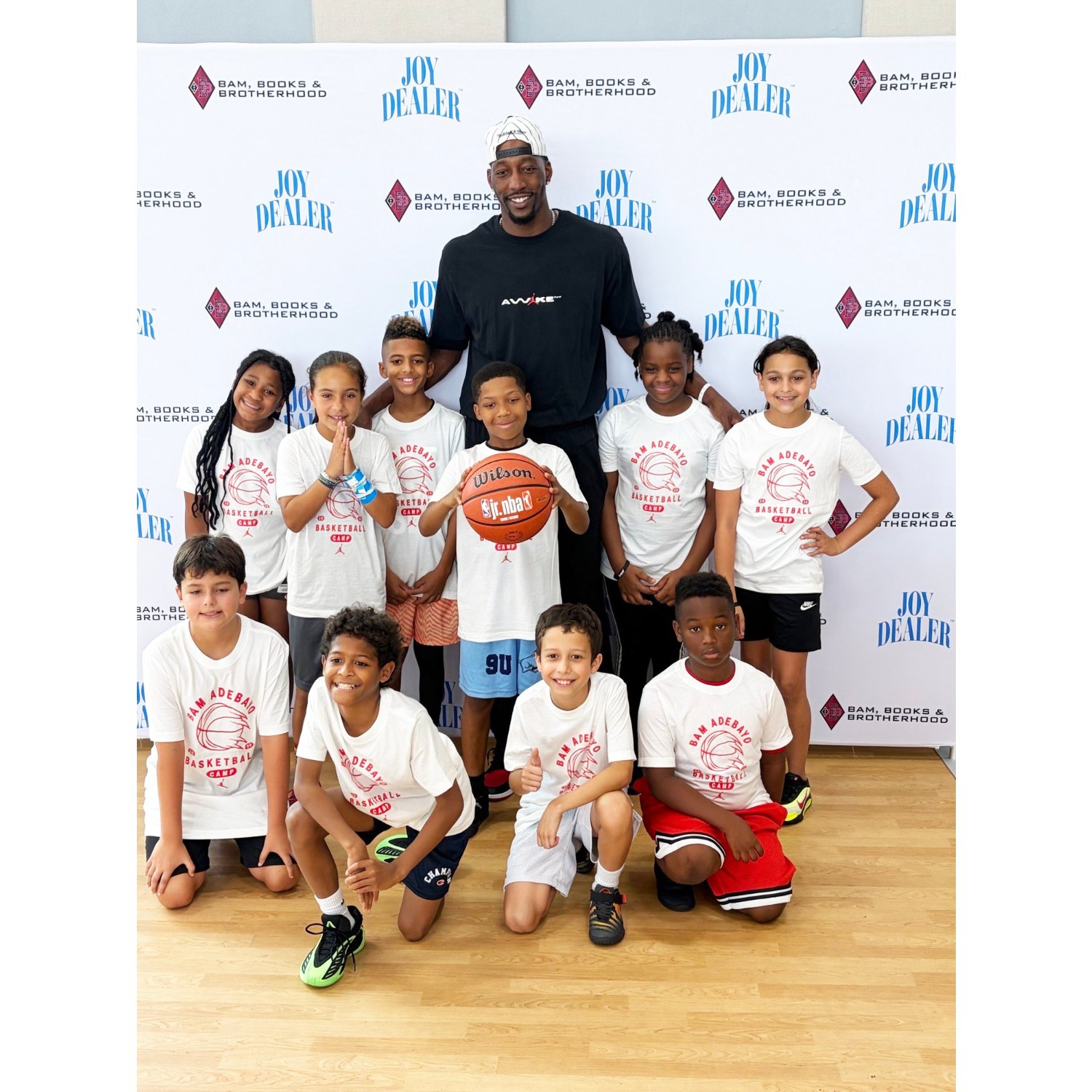 Miami Heat star Bam Adebayo with Florida City youth at his basketball camp