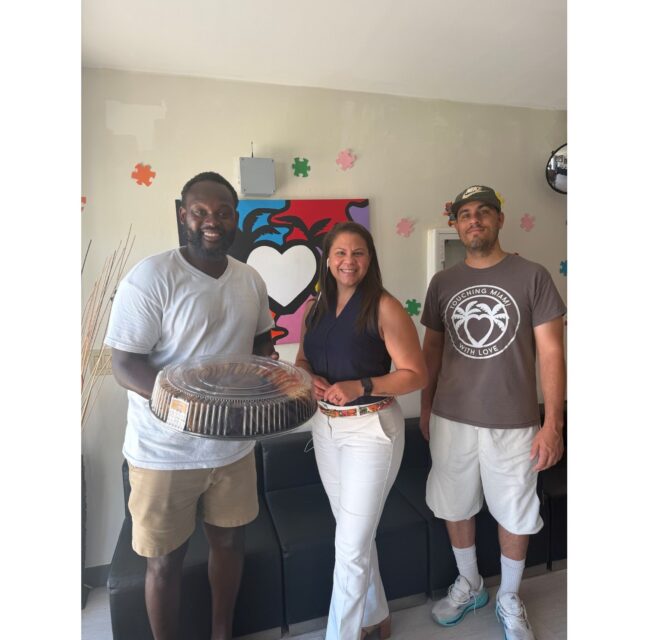 South Dade Chamber staff presenting a plaque during an August business visit