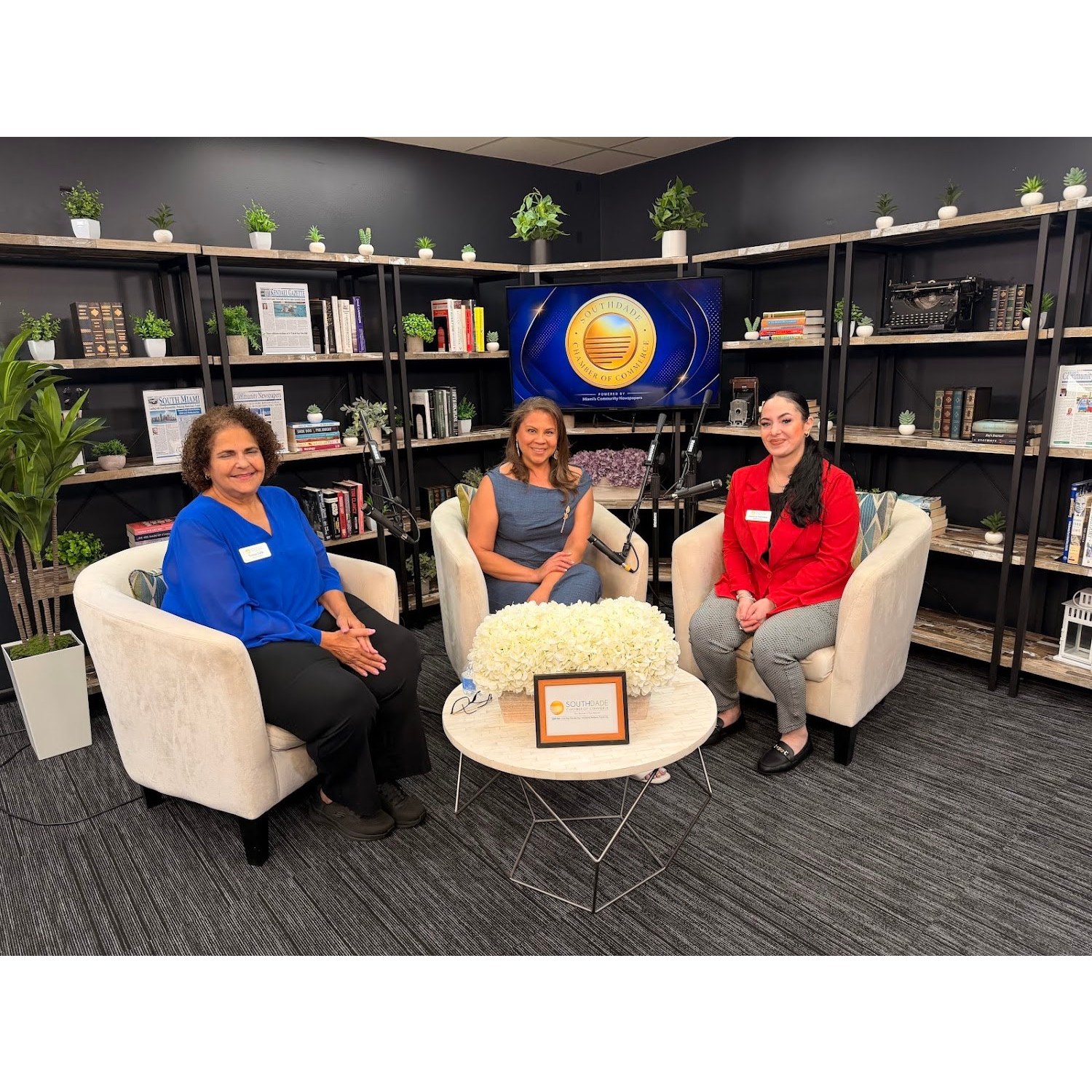 Lisa Albizu-Vazquez with board members Teresa Safie and Jessie Feliciano taping Chamber Shoutout