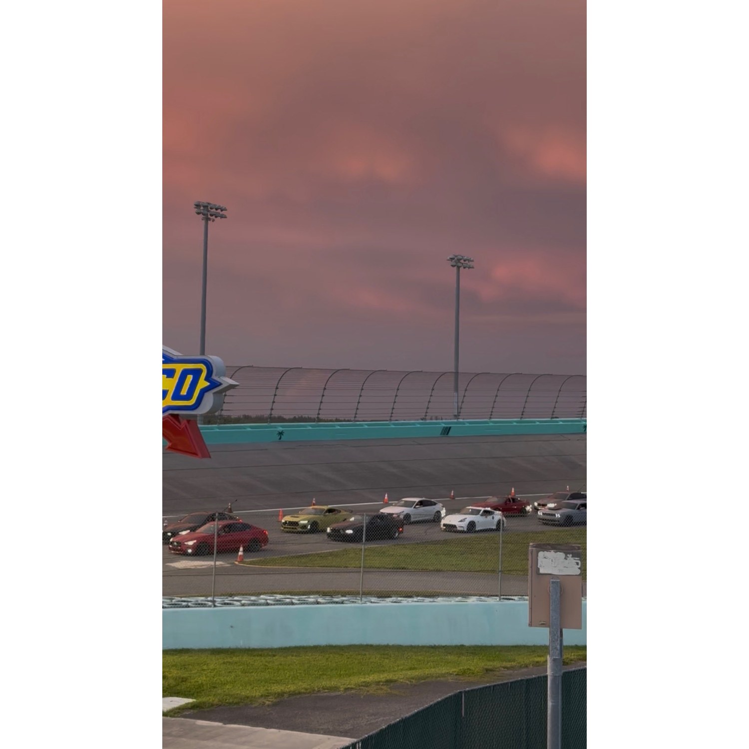 Homestead-Miami Speedway grandstands at sunset during Fast Lane Friday