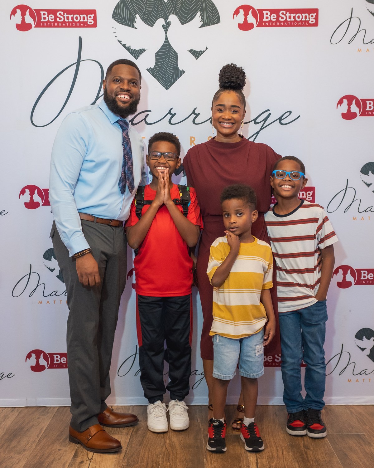 Parents and their three sons at the Be Strong International Marriage Matters event