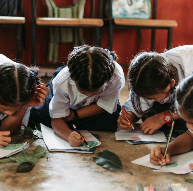 Students working together on a class assignment