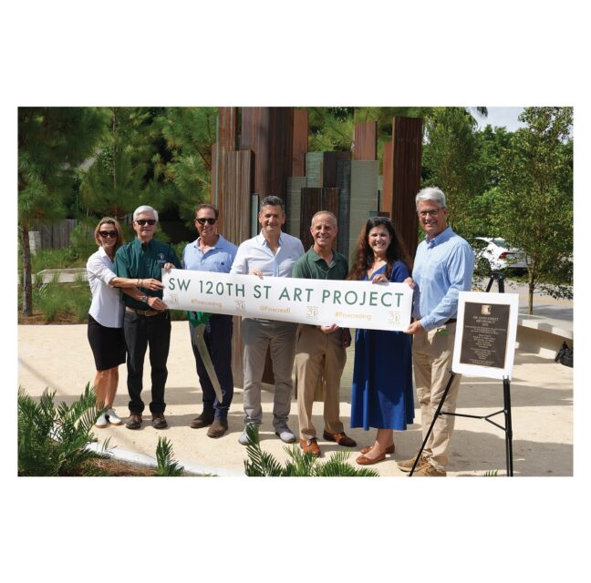 Pinecrest officials with the SW 120th Street Art Project banner at Traversal