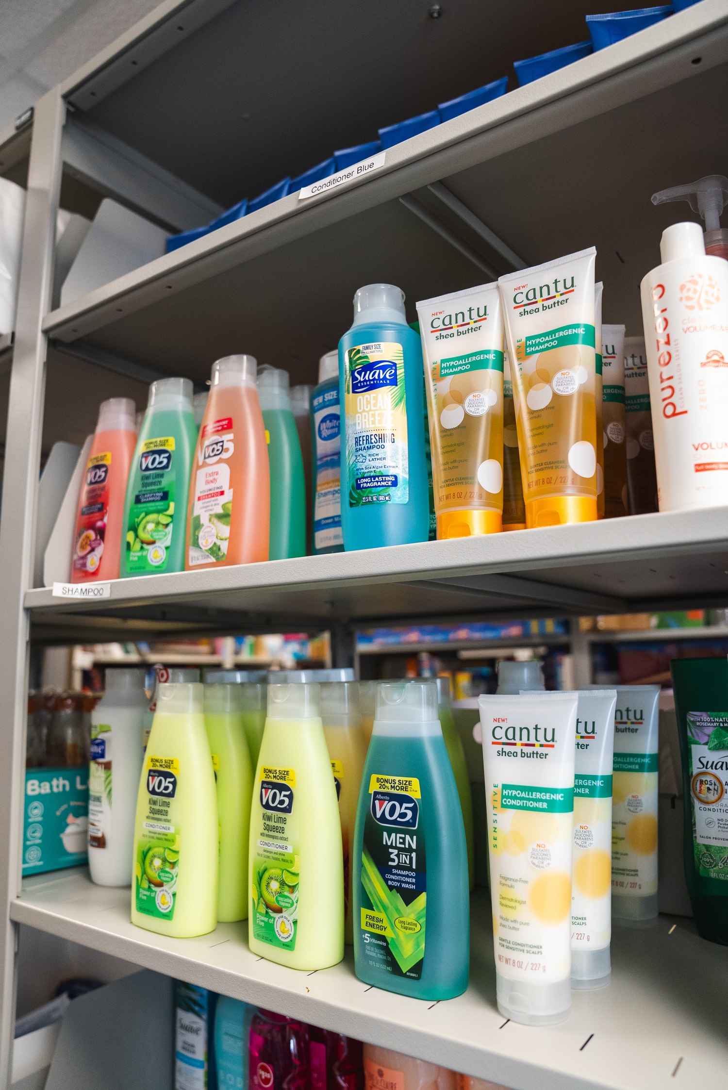 Shelves of shampoo, conditioner and toiletries stocked in the Comfort Closet