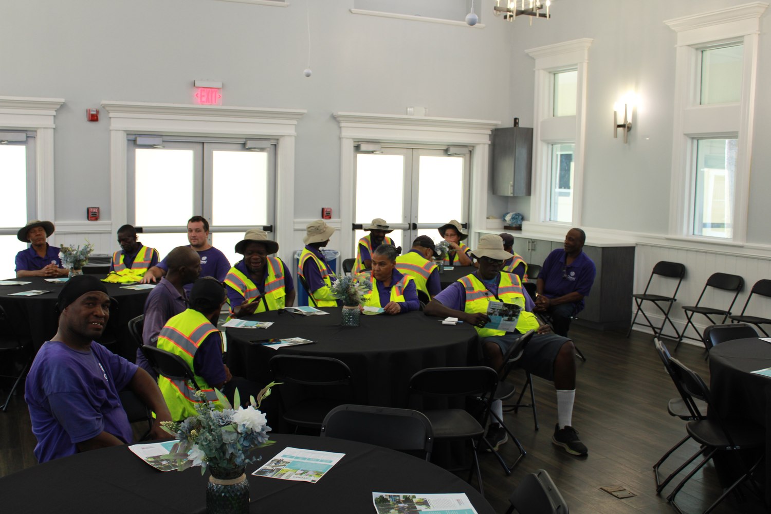 Community Impact Team participants seated at the partnership luncheon